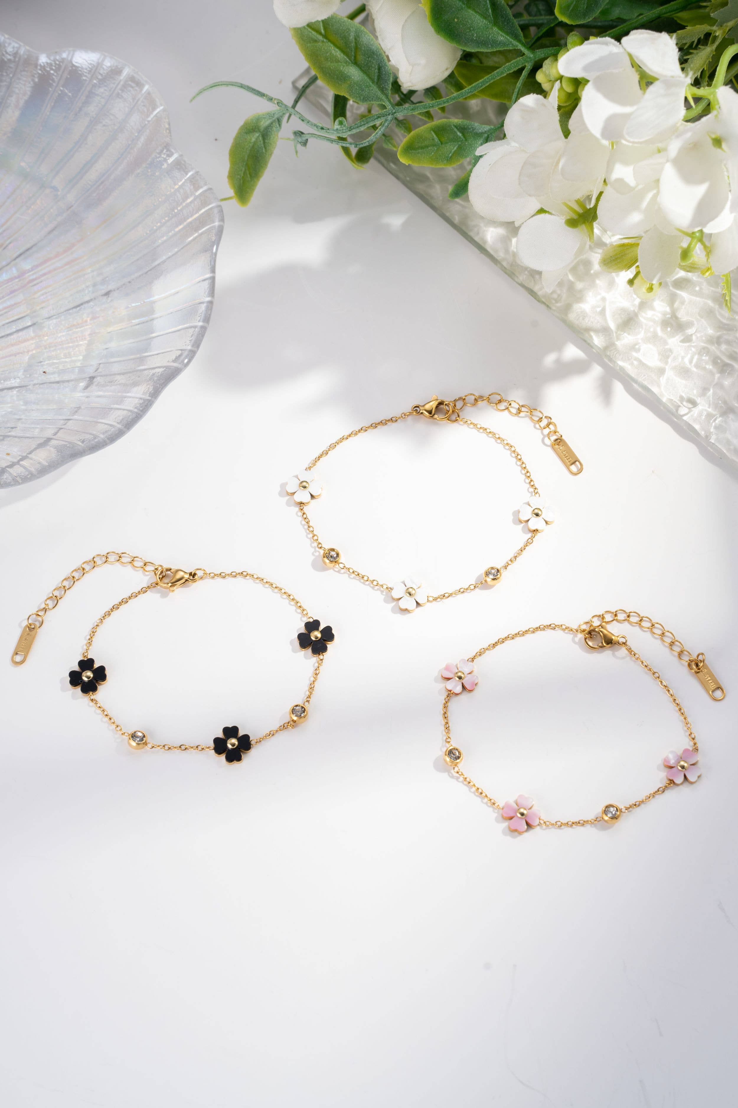 Boho Studio gold-tone bracelets set with mother-of-pearl flower accents