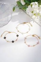 Boho Studio gold-tone bracelets set with mother-of-pearl flower accents
