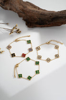 Boho Studio gold-tone bracelets set with colourful enamel flower accents